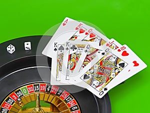 Casino - playing cards on green broadcloth.