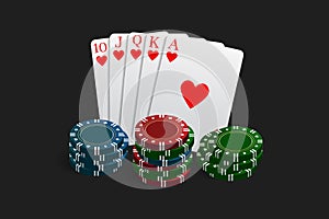 Casino and poker chips combined with a Royal Flush hand