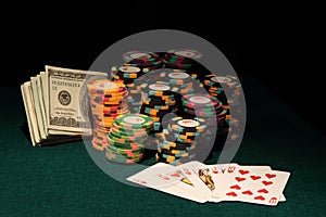 Casino Poker chips with Royal flush and Money