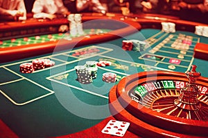 casino roulette game on green table
