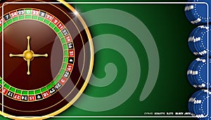 Casino roulette wheel with casino chips on green casino table