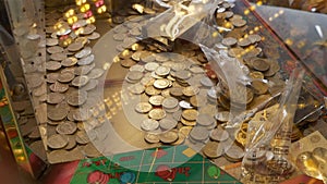 Casino slot machine filled with British 10 pence coins