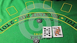 Casino table with poker player hands and playing card