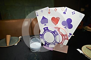 casino themed party decorations - playing cards, poker chips