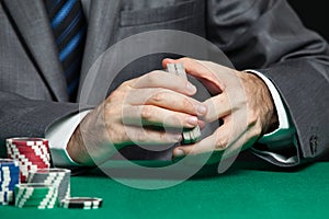 Casino worker shuffling cards