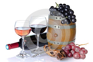 Cask, bottle and glasses of wine with red and black grapes