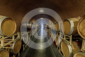 Cask storage in underground wine cellar in California Wine Country