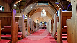 Casket in chapel lowered into tomb for burial