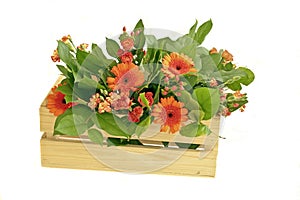 Casket with orange flowers