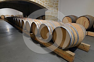 Casks in wine cellar