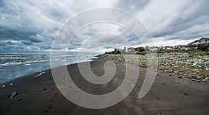 Caspian sea under blue sky in early September, snag on the beach