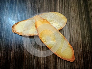 Cassava chips are a food made from thinly sliced cassava and then fried using cooking oil.