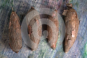 Cassava roots on rustic background