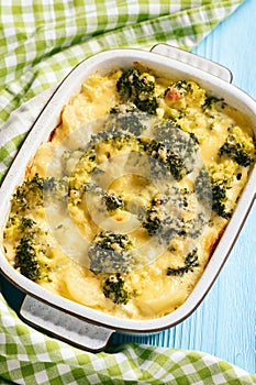 Casserole with broccoli, potatoes, eggs and cheese.