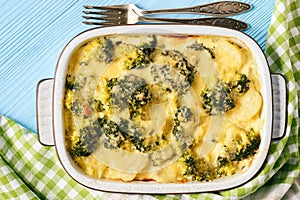 Casserole with broccoli, potatoes, eggs and cheese.