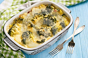 Casserole with broccoli, potatoes, eggs and cheese.