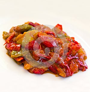 Casserole with grilled red bell pepper , close up