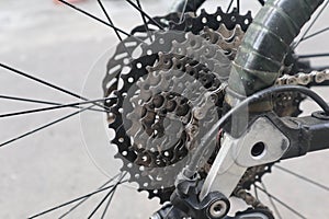 cassette and chain, Closeup bicycle gear wheels, mechanic gears cassette and chain at the rear wheel of folding bike