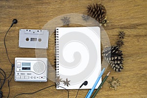 Cassette tape audio player and blank paper vintage still life