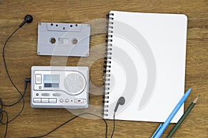 Cassette tape audio player and blank paper vintage still life