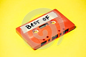 Cassette tape orange on yellow best of