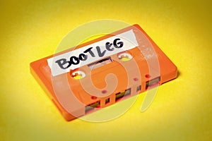 Cassette tape orange on yellow bootleg photo