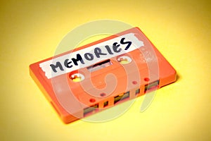 Cassette tape orange on yellow memories