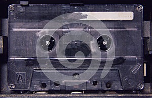 Cassette tape in player 90s scratched