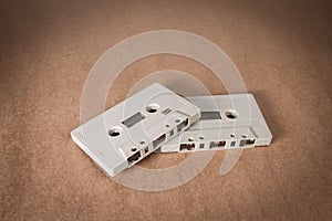 Cassette tapes on brown paper background. Vintage style