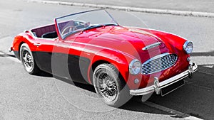 Cassic red Austin Healey sports car