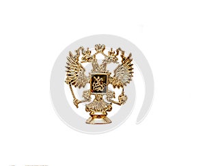 Cast bronze Russian coat of arms isolated on a white background. Russian State Emblem - a double headed eagle.