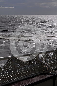 Cast iron antique bench at the seaside