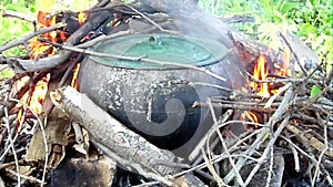 Cast iron cauldron for cooking can be used on an open fire