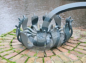 Cast iron decoration on the edge of a bridge in Amsterdam