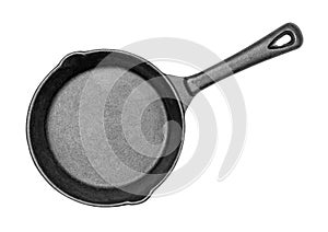 Cast-iron frying pan on an isolated white background