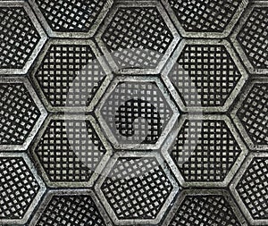 Cast iron hexagonal factory floor texture.