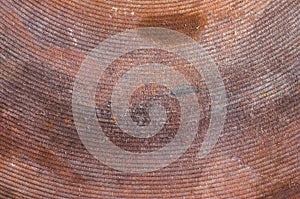 Cast-iron pancake of enameled kitchen electric stove close-up, macro shot. Dirt stuck in the ribs, corrosion of old heating