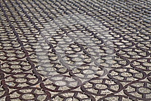 Cast-iron pavement in Kronstadt on the Yakornaya Square. Saint-Petersburg, Russia