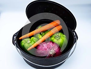 Cast iron pot with vegetables