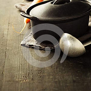 Cast iron pot and vegetables