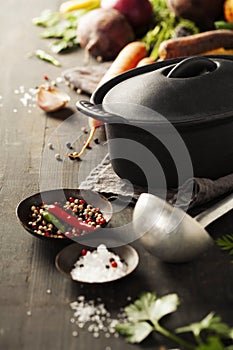 Cast iron pot and vegetables