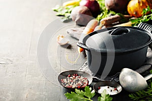 Cast iron pot and vegetables