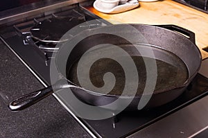 Cast iron skillet or fry pan on stove photo