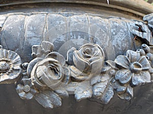 Cast-iron vase in the park. Park Palace of Dulber. The palace was built according in the spirit of the ancient temple building