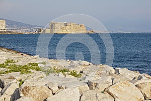 Castel dell`Ovo italian for the Egg fortress in the harbor of Naples in Italy, with the Gulf of Naples