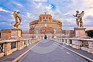 Castel Sant Angelo or The Mausoleum of Hadrian and Tiber river bridge in Rome photo