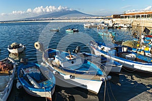 Castellammare di Stabia, Naples, Italy - fishermen boats, blue sea and Vesuvius volcano