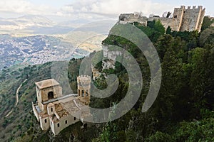 Castello di Venere and Torretta Pepoli historical building in historical town of Erice, Sicily in shadow photo