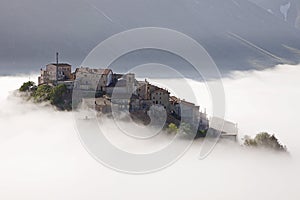 Castelluccio rising from the mist, Umbria, Italy