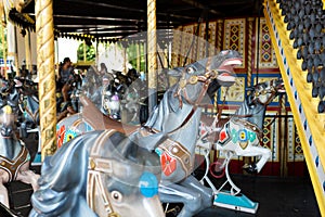 Castelnuovo del Garda, Italy - August 13 2019: Favorite carousel for children and adult horses. Gardaland Theme Park in